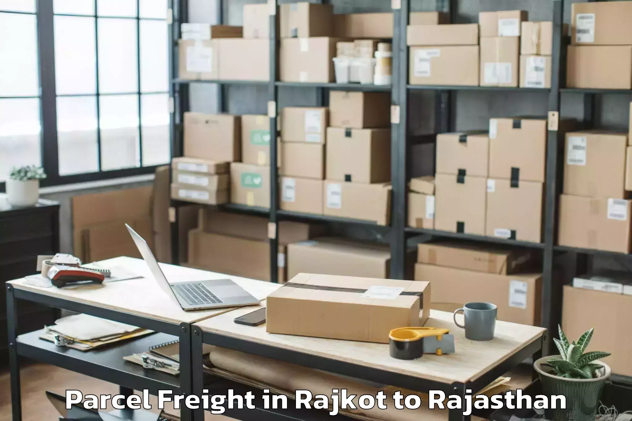 Expert Rajkot to Abhilashi University Jodhpur Parcel Freight